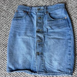 Women’s light wash denim skirt with buttons